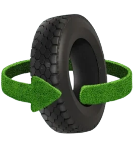 Recycled tire encircled by green grass arrow